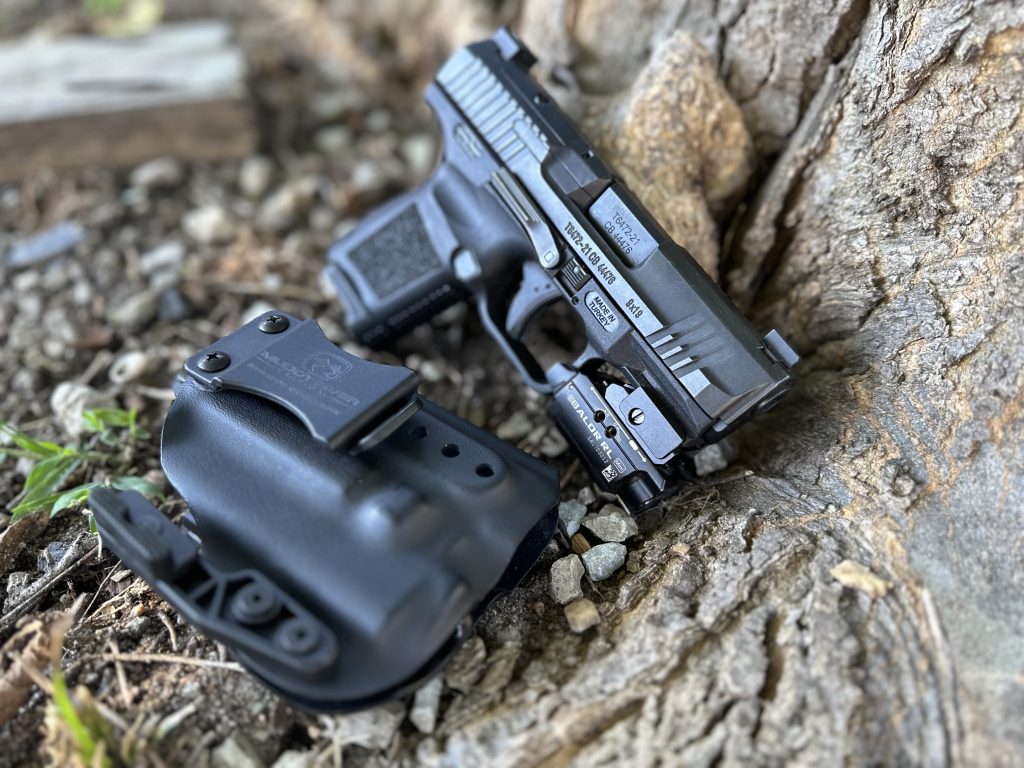 Canik TP9 Elite SC with Olight Baldr Mini Light Holster